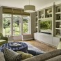 Family Fun Meets Moody Members Club | Family TV area with bespoke media unit | Interior Designers